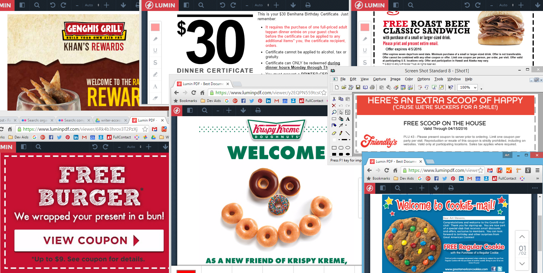 A stack of free restaurant meal coupons received by signing up for restaurant email lists.